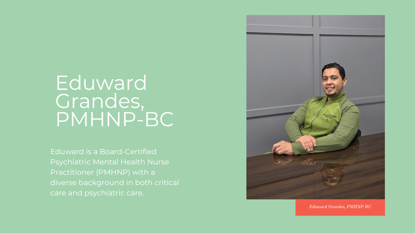 Eduward Grandes, PMHNP-BC sitting behind a desk wearing a green shirt with his name
